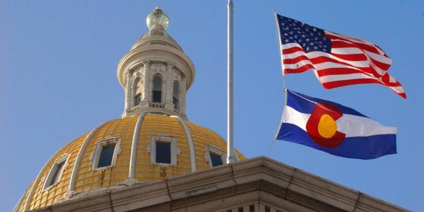U.S. and babyֱapp state flags at babyֱapp State Capitol Building